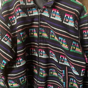 Vintage Hand Embroidered Vibrant jacket with a geometric pattern. 
Colorful M-L